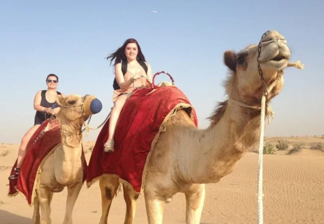 Camel ride across the Lahbab desert dunes near Dubai