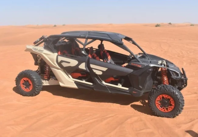 Can-Am Maverick X3 four-seater group buggy on Dubai red sand