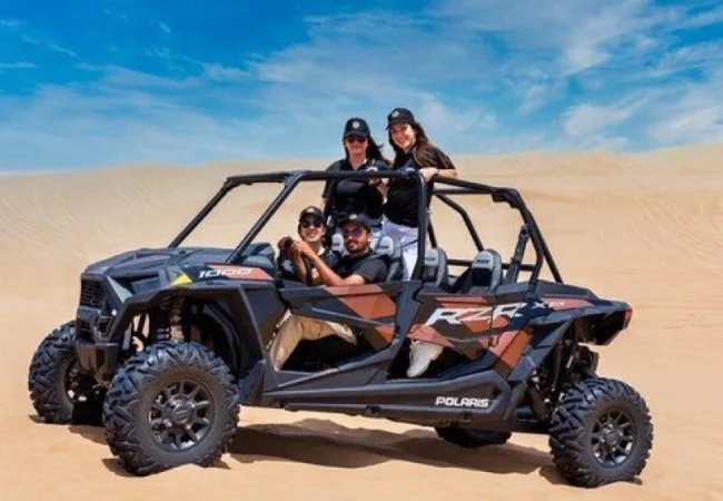 Polaris RZR 1000 four-seater family dune buggy in the Dubai desert